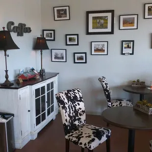 cow print chairs and table