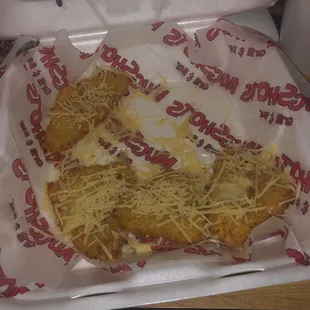 They&apos;re barely cooked if at all. They taste like rubber dog shit dropped in a fryer.