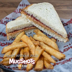 a peanut butter jelly sandwich and fries
