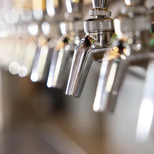a close up of a beer tap