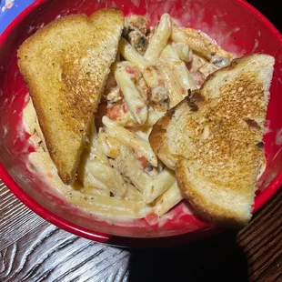 Cajun pasta...stirred and reheated straight from the kitchen.