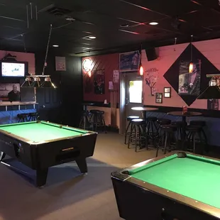a pool table and bar