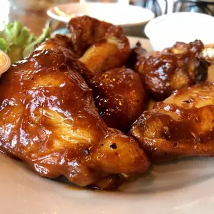 Smoked chicken wings in BBQ sauce - sweet tangy flavor