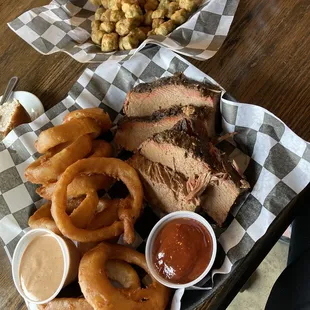 Sliced brisket, onion rings and fried okra