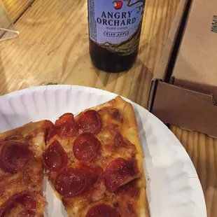 Try the pizza from Minellis next door!