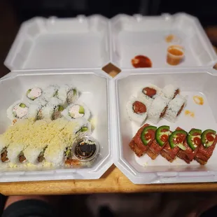 two trays of food on a table
