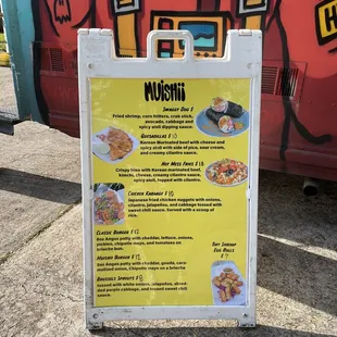 a menu on a sidewalk