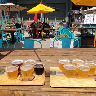 Two beer flights on the outdoor patio.