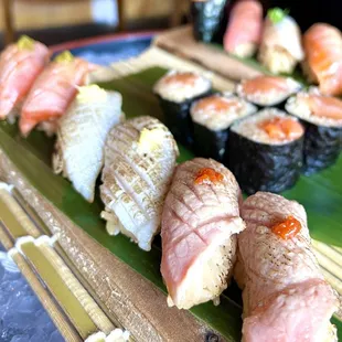 In the front: Toro trio - chefs's choice of 3 types if fatty fish belly of the day (2 pcs each) (07/2024)