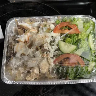 Combo over rice (lamb (gyro) and chicken) with white sauce and hot sauce. Chicken and lamb were very well seasoned.