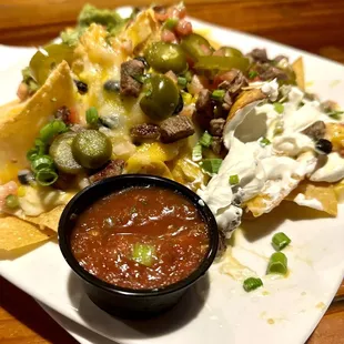 Steak nachos but where&apos;s the steak?!?! Smaller portions compared to the last time I was here a couple months ago.