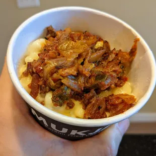 Mac &amp; Cheese. Kimchi, bacon, smoked Gouda. $3. Your price may vary.