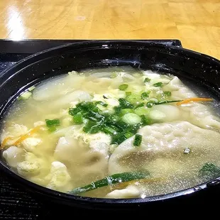 Dumpling, rice cake, egg soup