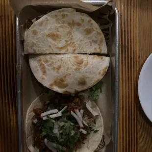 Carnitas taco and Carnitas Mula. Very tender meat!