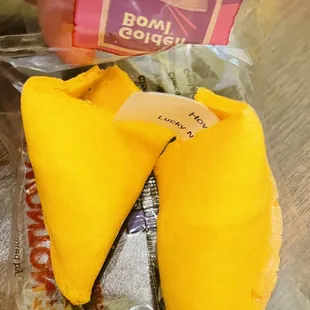 a hand holding a piece of food