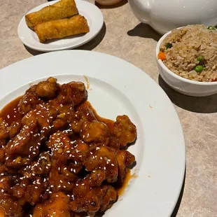 Sesame chicken w/ veggie rices and egg rolls