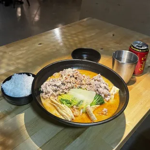 mild spicy pork broth with rice + thinly sliced beef.
