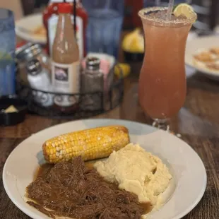 Roast, Potatoes &amp; Gravy $25.00 Slow cooked brisket flat debris served with garlic creamed potatoes &amp; grilled sweet corn