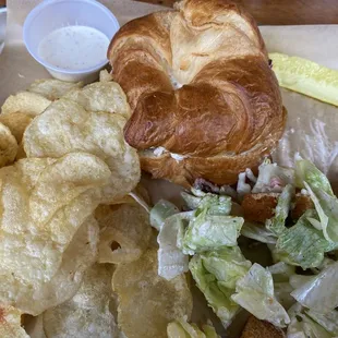 Chicken Salad sandwich/ croissant with half of the house salad