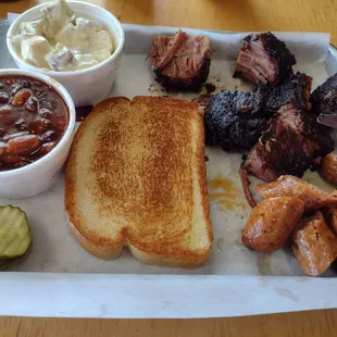 Brisket Burnt Ends, Spicy Sausage, Beans and Potato Salad.