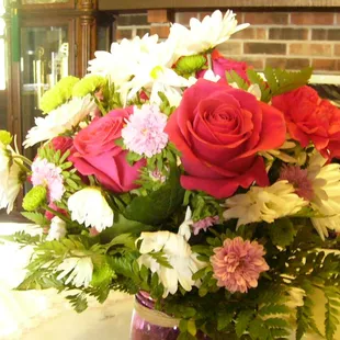 Shasta Daisies are dead,Roses bloomed out.