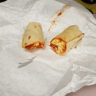 Breakfast burrito cold eggs from who know when it's made, barely 2 slice of bacon $4.49 + tax