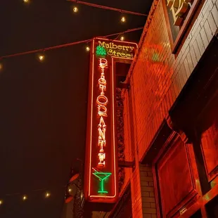Classic neon sign outside the entrance.