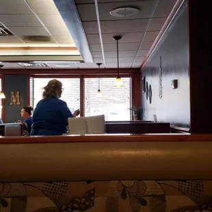 a woman sitting at a table