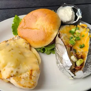 SUPER tender smothered chicken sandwich and loaded baked potato