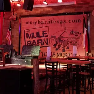 a bar with a large screen