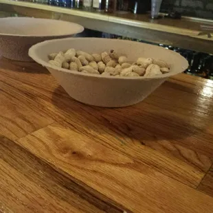two bowls of peanuts
