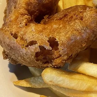 There's so much batter, that there's actually a hole with no fish in sight.