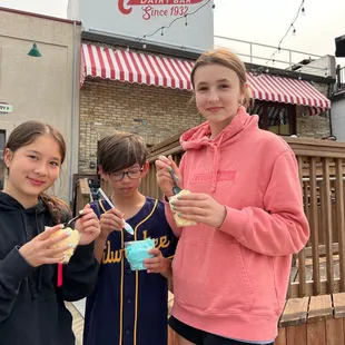 three girls eating ice cream