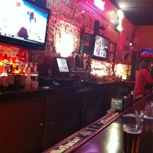 a bar with televisions
