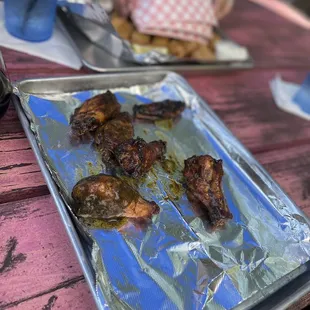 House sauce wings, grouper nuggets @back