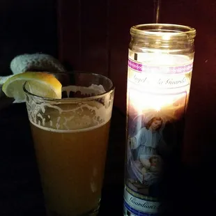 Occidental Hefe and the Guardian Angel candle keeping me company.