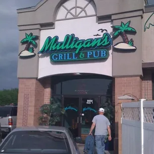 a man walking out of the door