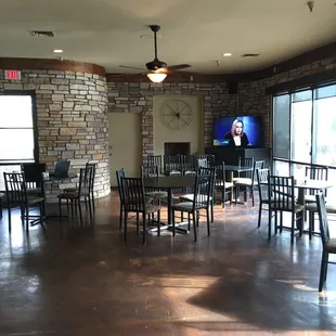 Dining area. Huge Windows that look out onto the golf course.