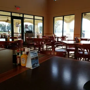 a restaurant with tables and chairs