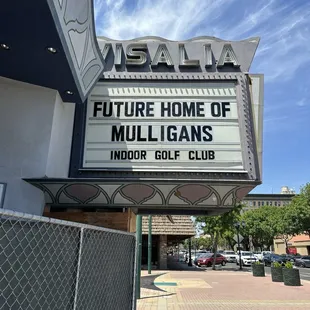 a sign for the future home of mulligans