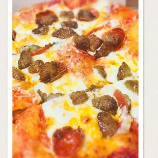 a closeup of a pizza