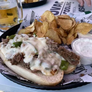 excellente Philly cheese steak. Horsey sauce makes all the difference. Good chip dip add too