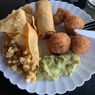 Happy Hour corn salsa, chips, Guac, fried mushrooms, and veggie roll.