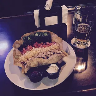Taco salad with grilled chicken and an IPA I highly suggest the taco salad.