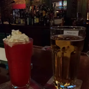 Frosty beer and yummy strawberry daiquiri