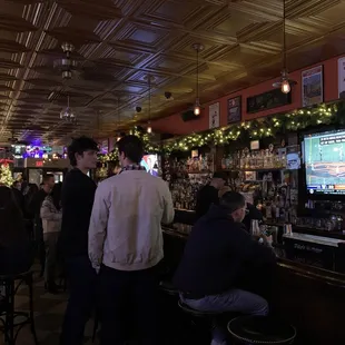 people sitting at the bar
