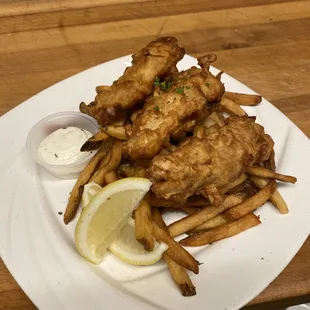 Beer battered fresh cod and chips with house made tartar sauce