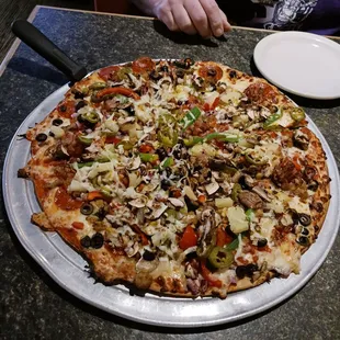 Supreme pizza. It has a name. My husband ordered it.