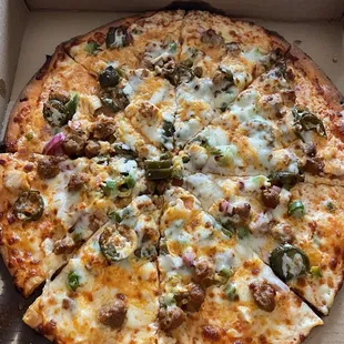 12&quot; Buffalo chicken pizza (banana peppers, sausage, onion, jalepeños)