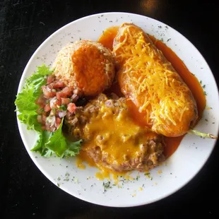 Chile Relleno Breaded and pan fried green chili stuffed with cheeses, comes with re-fried beans, pico de gallo, and mexican rice.